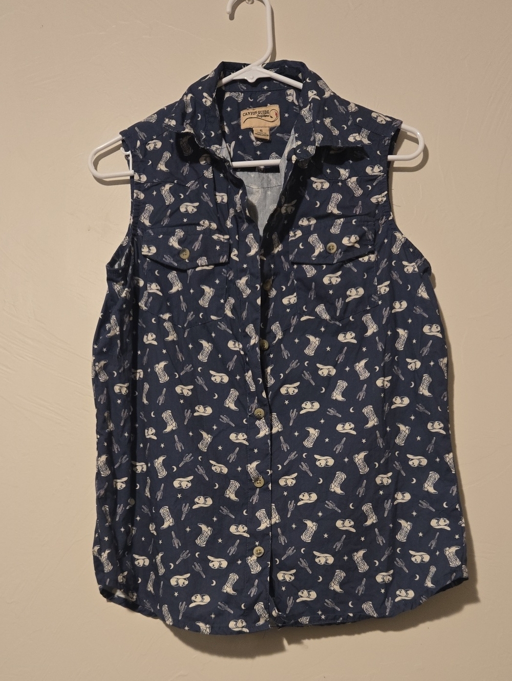 Sleeveless Navy Button-Down Shirt with White Novelty Print
